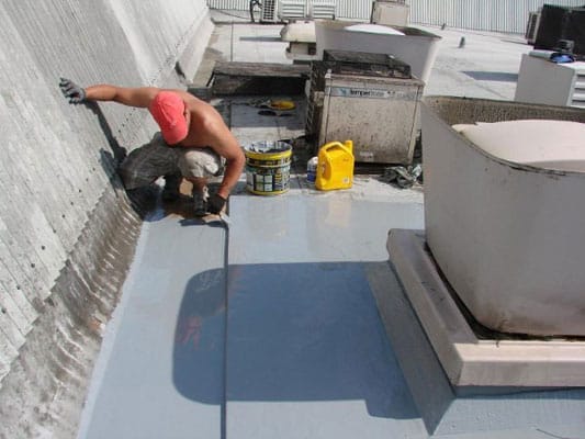 Flat roof waterproofing and membrane coating applied by Dr Roof NZ to protect against leaks and UV damage